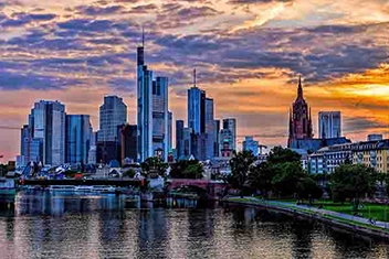 Frankfurt skyline at sunset with the Main River
